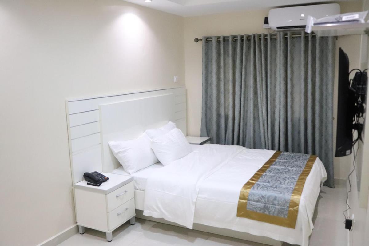 Appleville Suites Икеджа Екстериор снимка
