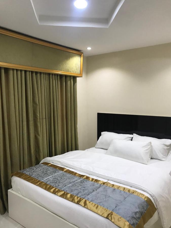 Appleville Suites Икеджа Екстериор снимка