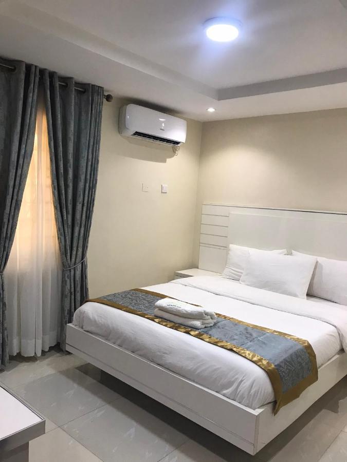 Appleville Suites Икеджа Екстериор снимка