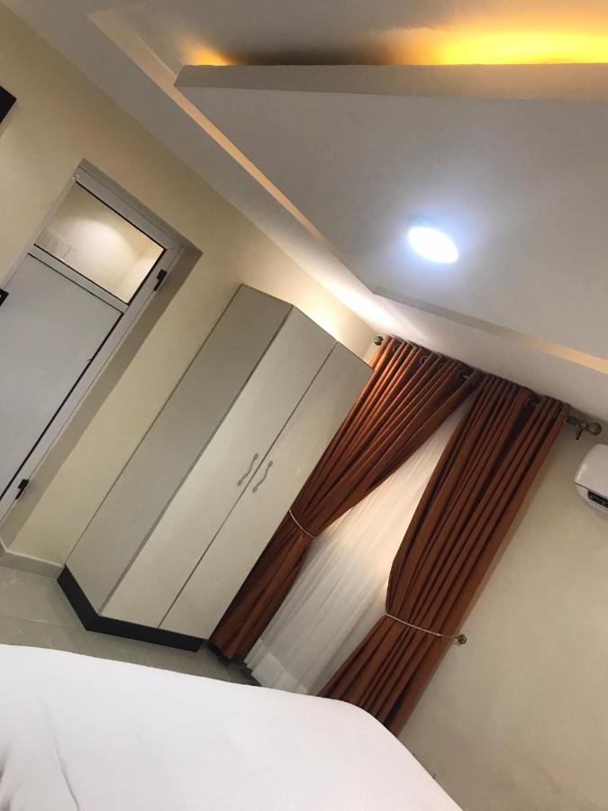 Appleville Suites Икеджа Екстериор снимка