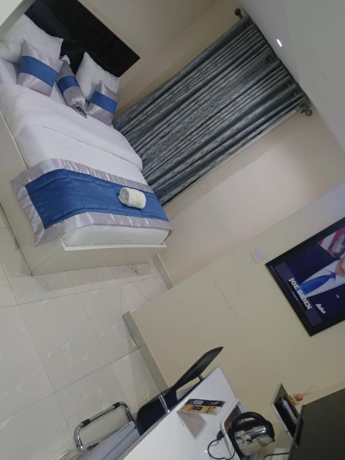 Appleville Suites Икеджа Екстериор снимка