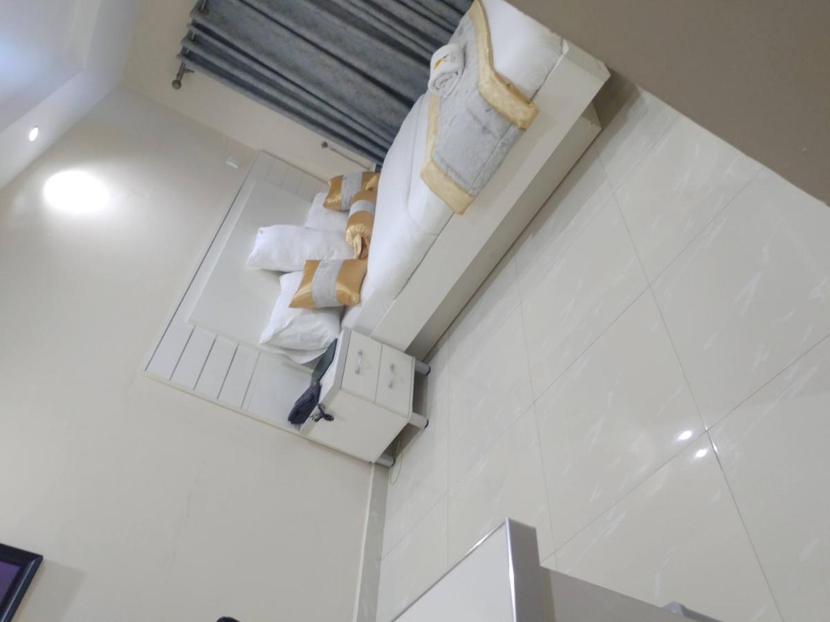 Appleville Suites Икеджа Екстериор снимка
