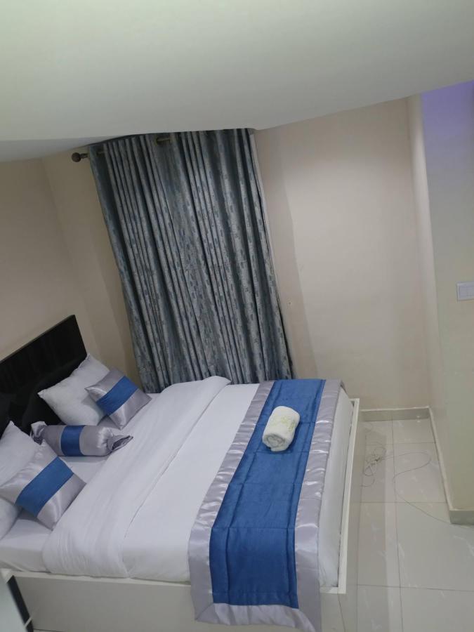 Appleville Suites Икеджа Екстериор снимка